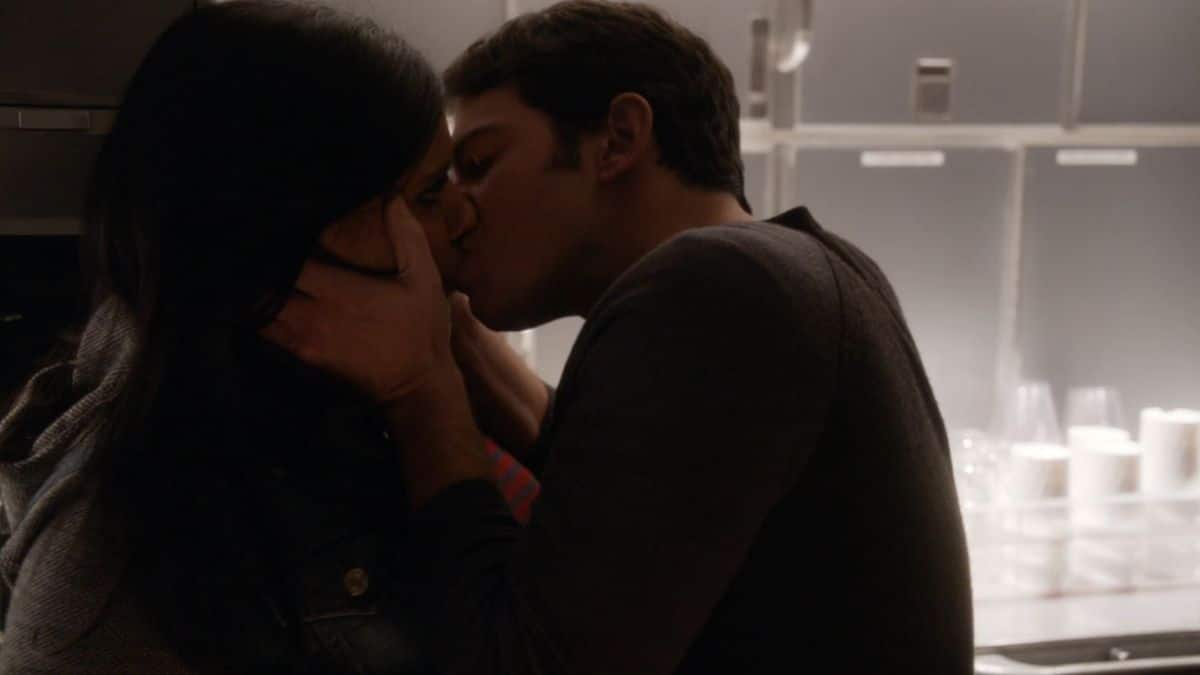 Danny and Mindy kissing