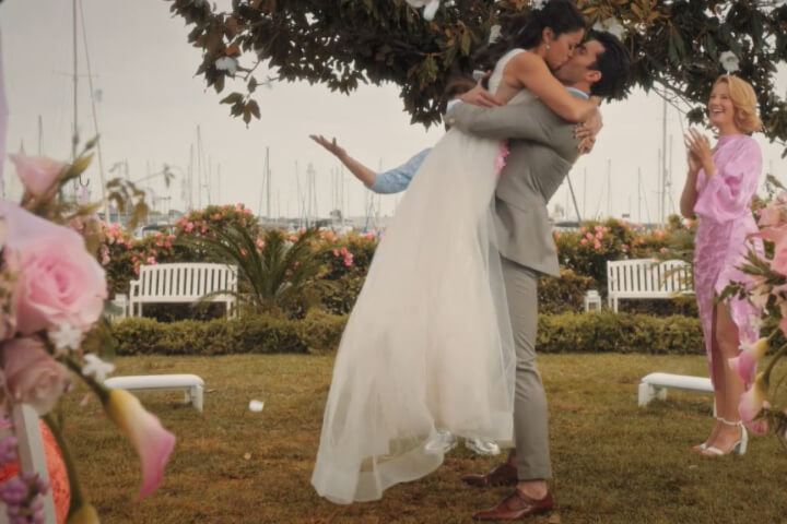 A romantic wedding kiss.